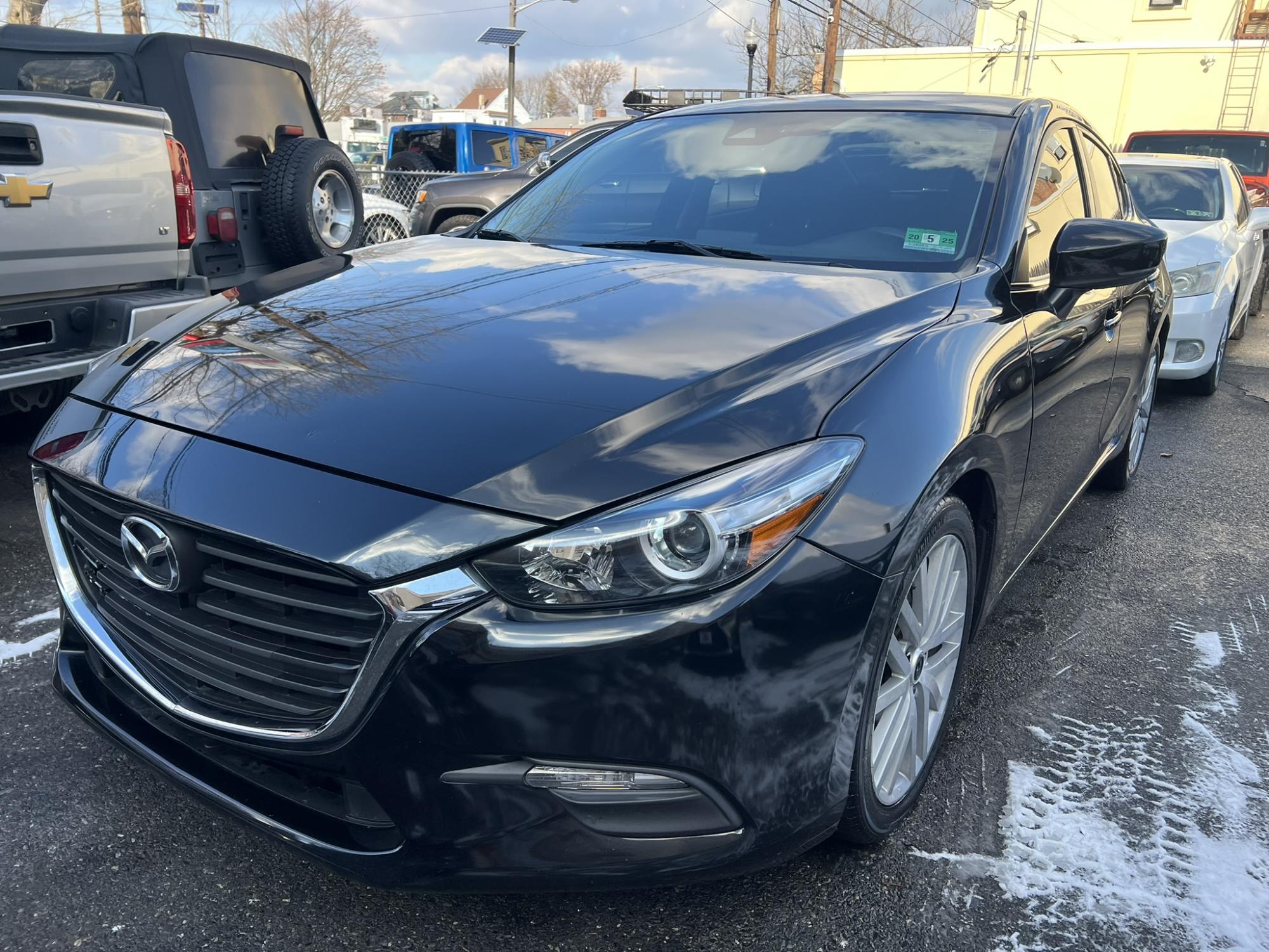 photo of 2018 Mazda MAZDA3 i Sport MT 4-Door