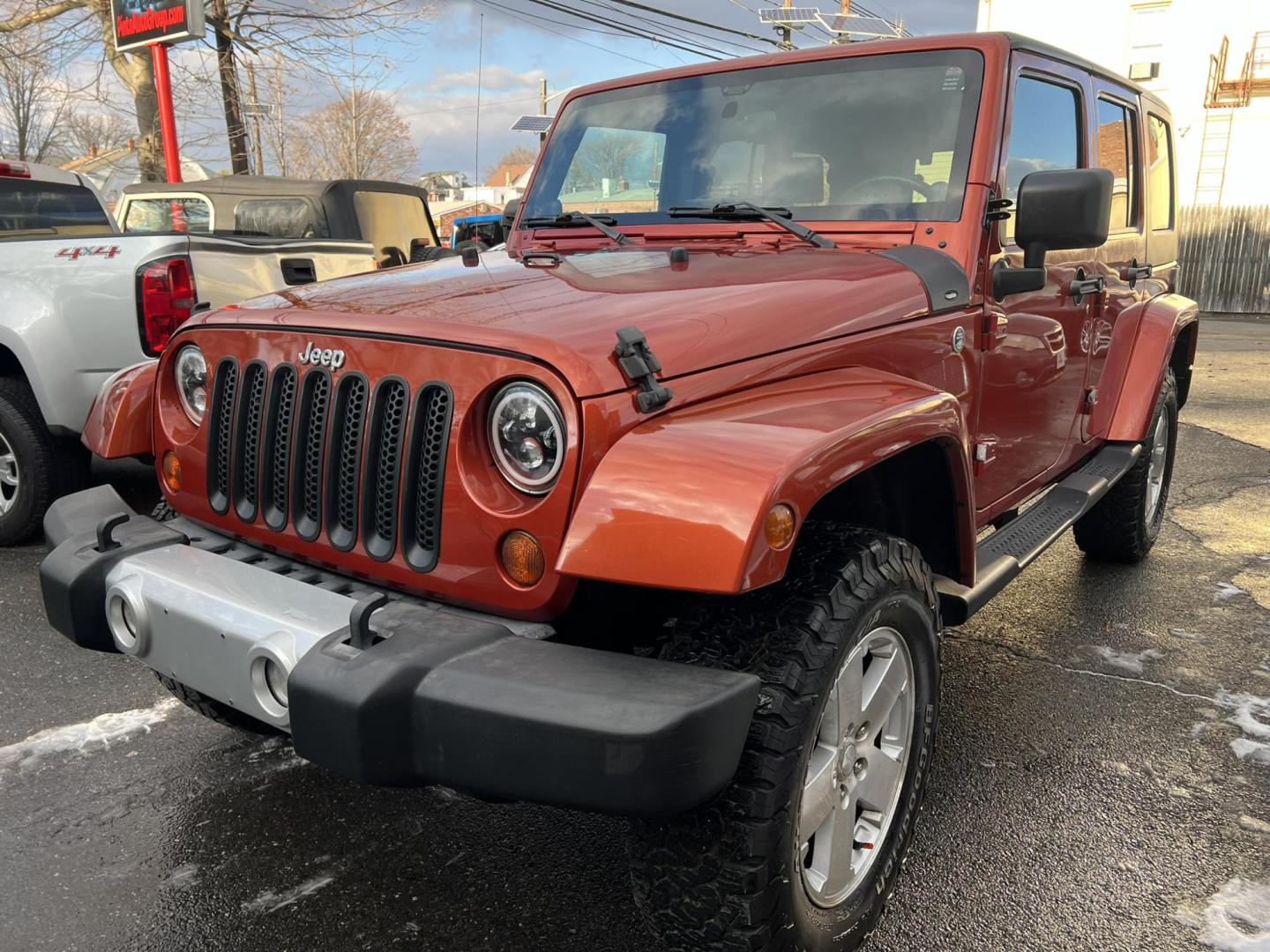 2009 Copper /Gray Jeep Wrangler Unlimited Sahara 4WD (1J8GA59109L) with an 3.8L V6 OHV 12V engine, located at 1018 Brunswick Ave, Trenton, NJ, 08638, (609) 989-0900, 40.240086, -74.748085 - Whoa, Here is a rare color Jeep Wrangler that has been serviced up and detailed to perfection and ready for new owner!! Runs and drives like new 100% - Photo#2