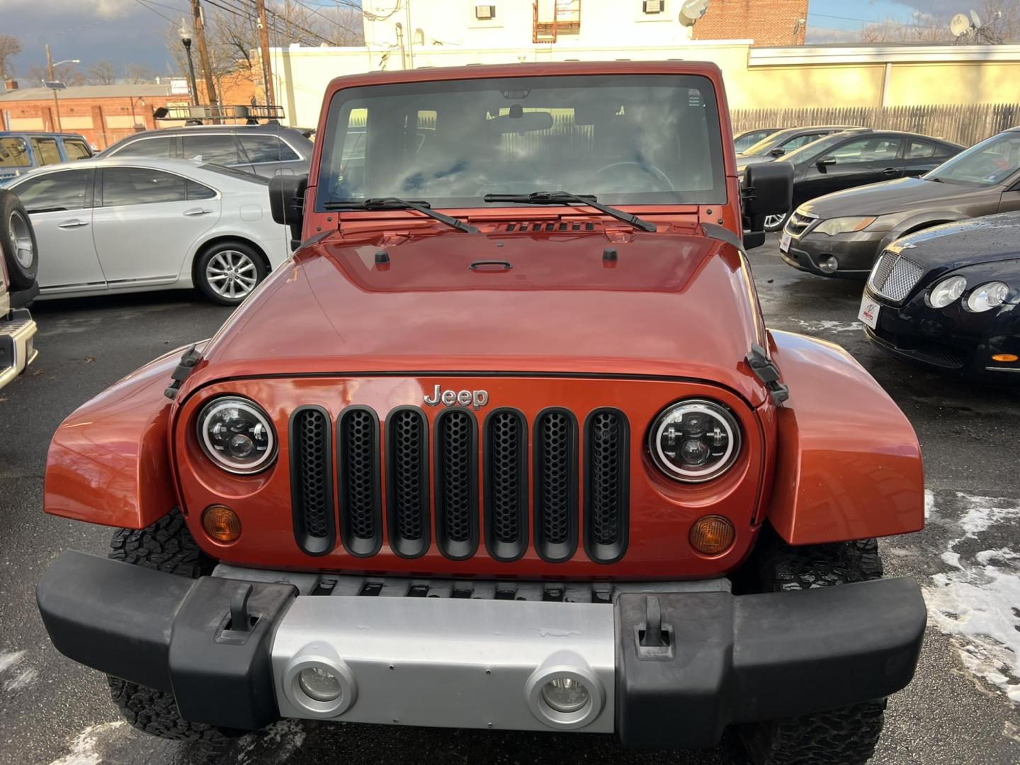 2009 Copper /Gray Jeep Wrangler Unlimited Sahara 4WD (1J8GA59109L) with an 3.8L V6 OHV 12V engine, located at 1018 Brunswick Ave, Trenton, NJ, 08638, (609) 989-0900, 40.240086, -74.748085 - Whoa, Here is a rare color Jeep Wrangler that has been serviced up and detailed to perfection and ready for new owner!! Runs and drives like new 100% - Photo#4