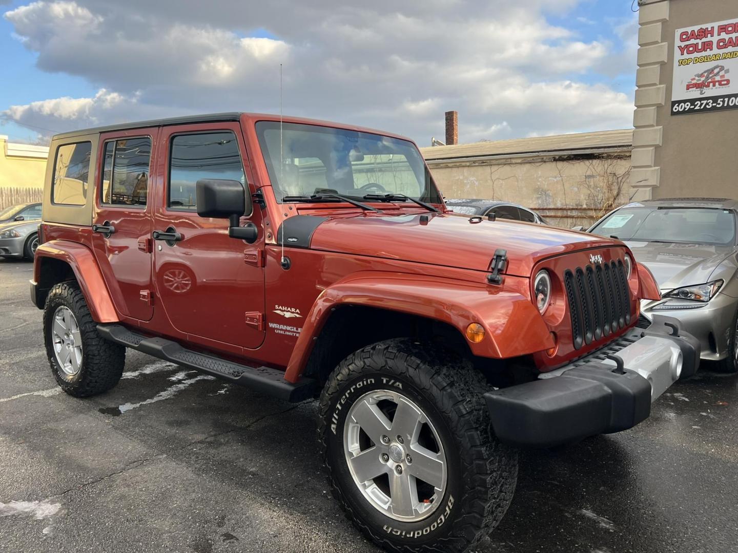 2009 Copper /Gray Jeep Wrangler Unlimited Sahara 4WD (1J8GA59109L) with an 3.8L V6 OHV 12V engine, located at 1018 Brunswick Ave, Trenton, NJ, 08638, (609) 989-0900, 40.240086, -74.748085 - Whoa, Here is a rare color Jeep Wrangler that has been serviced up and detailed to perfection and ready for new owner!! Runs and drives like new 100% - Photo#0