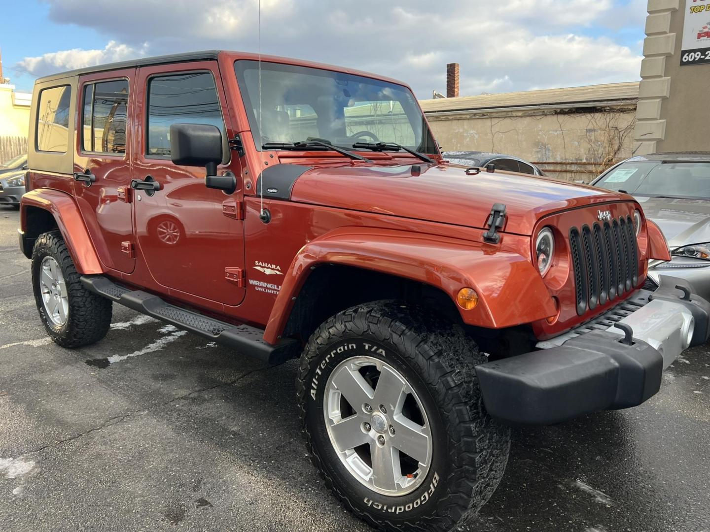 2009 Copper /Gray Jeep Wrangler Unlimited Sahara 4WD (1J8GA59109L) with an 3.8L V6 OHV 12V engine, located at 1018 Brunswick Ave, Trenton, NJ, 08638, (609) 989-0900, 40.240086, -74.748085 - Whoa, Here is a rare color Jeep Wrangler that has been serviced up and detailed to perfection and ready for new owner!! Runs and drives like new 100% - Photo#5