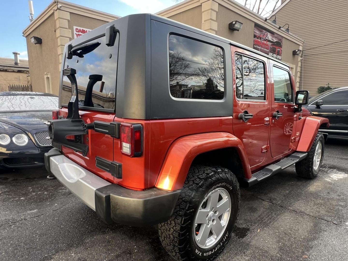 2009 Copper /Gray Jeep Wrangler Unlimited Sahara 4WD (1J8GA59109L) with an 3.8L V6 OHV 12V engine, located at 1018 Brunswick Ave, Trenton, NJ, 08638, (609) 989-0900, 40.240086, -74.748085 - Whoa, Here is a rare color Jeep Wrangler that has been serviced up and detailed to perfection and ready for new owner!! Runs and drives like new 100% - Photo#6